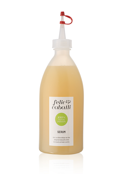 felici caballi - Serum grün Flasche mit Serum von Felic Caballi, 100% natürliche Inhaltsstoffe, beige Flüssigkeit in einer transparenten Flasche.