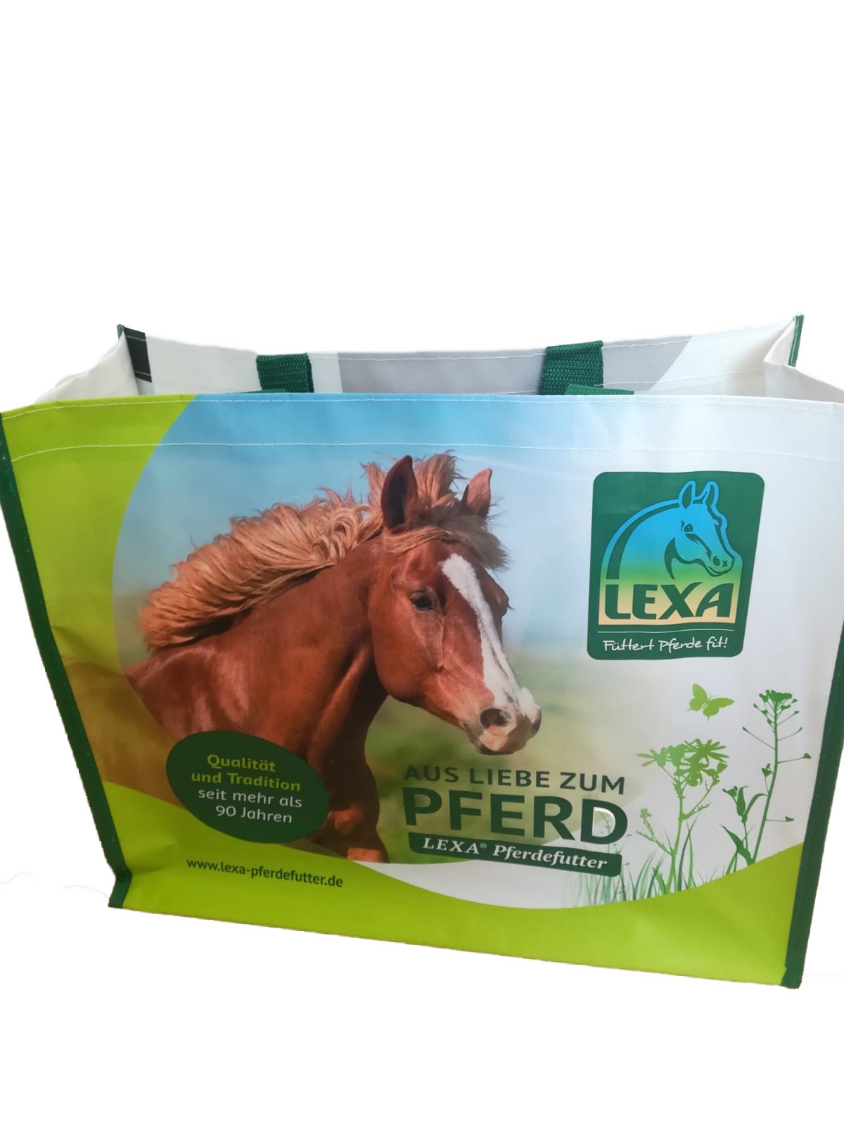 LEXA Pferdefutter Tragetasche Grüne Tragetasche mit einem Bild eines Pferdes und dem Text 'AUS LIEBE ZUM PFERD' von LEXA Pferdefutter.